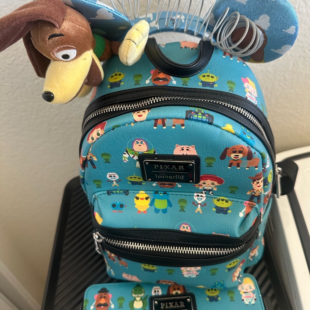 Loungefly Pixar Character Blue Mini Backpack - Picture 2 of 3